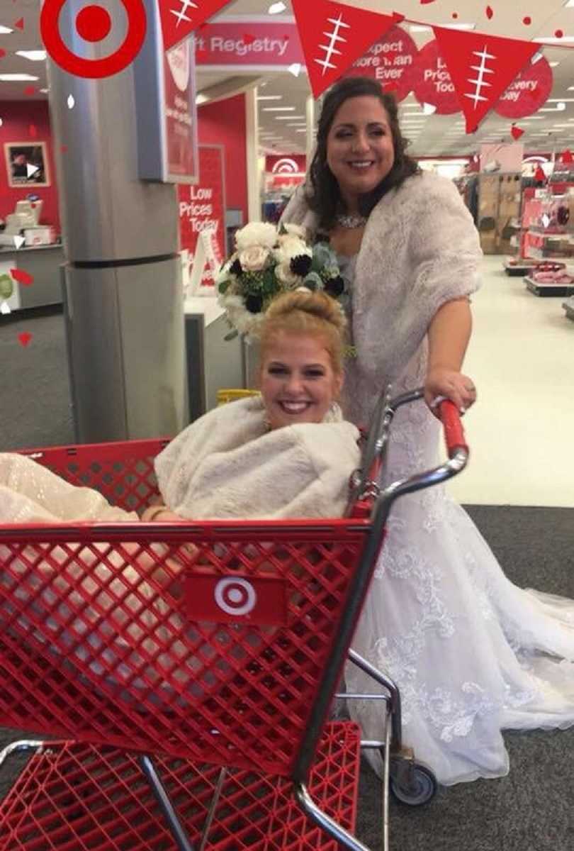 bride pushes woman in wedding in a target shopping cart
