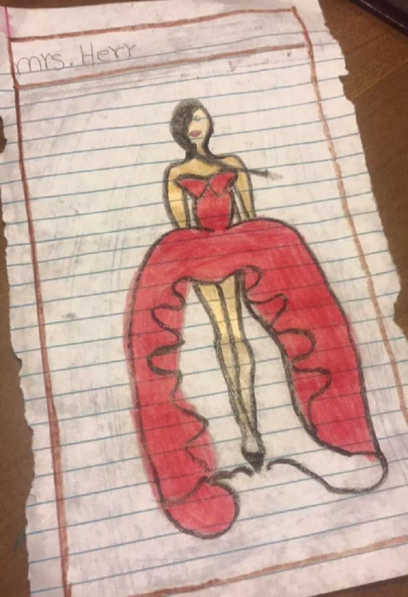 doodle on notebook paper of girl wearing fashionable red dress with, "Mrs. Herr" written on top of paper