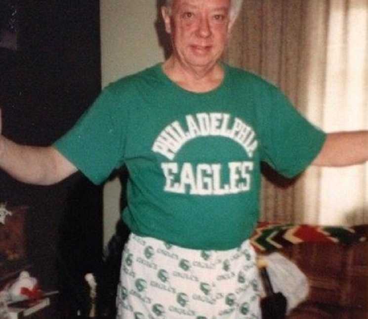 older man weating a philadelphia eagles tshirt and boxers 