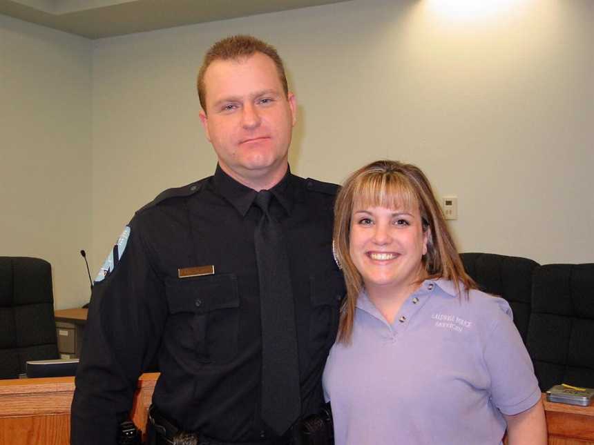 Cop diagnosed with pancreatic cancer stands next to his wife