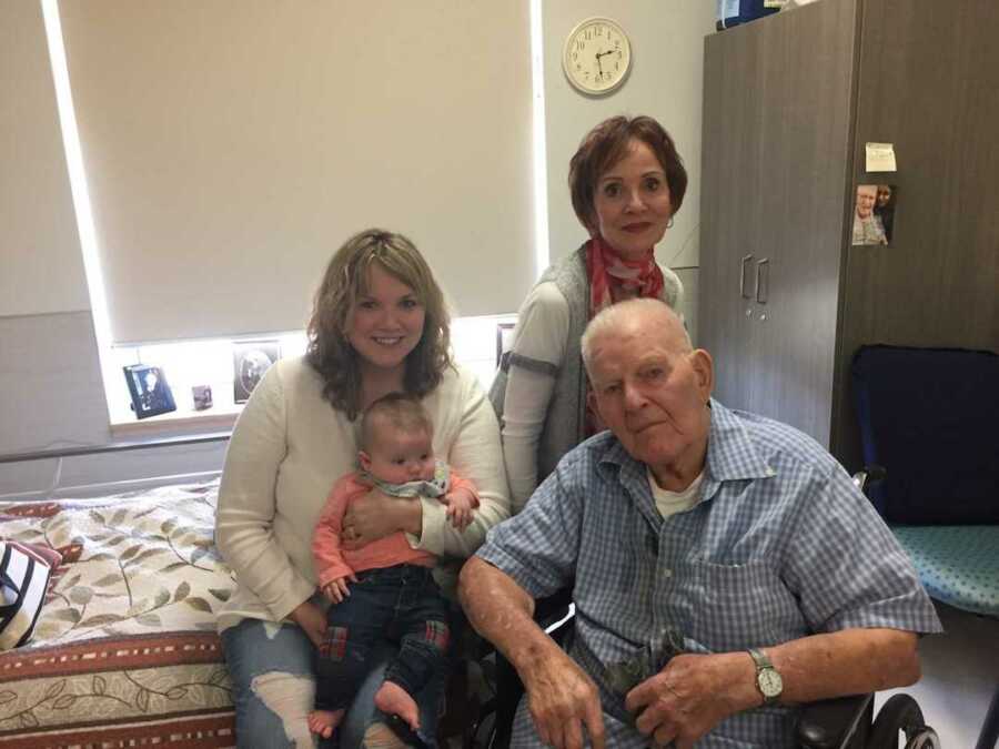 Family photo in hospital with newborn child