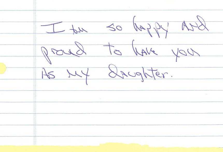 note written on notebook paper that says, "im so happy and proud to have you as my daughter"