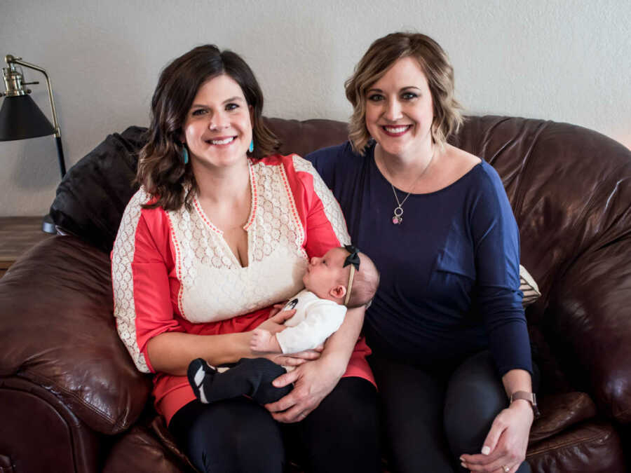 Beareaved mom smiles next to breast milk recipient