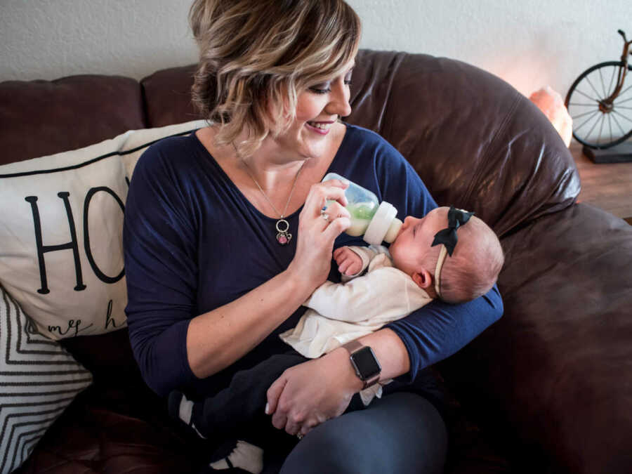 New mom feeds newborn donated breast milk