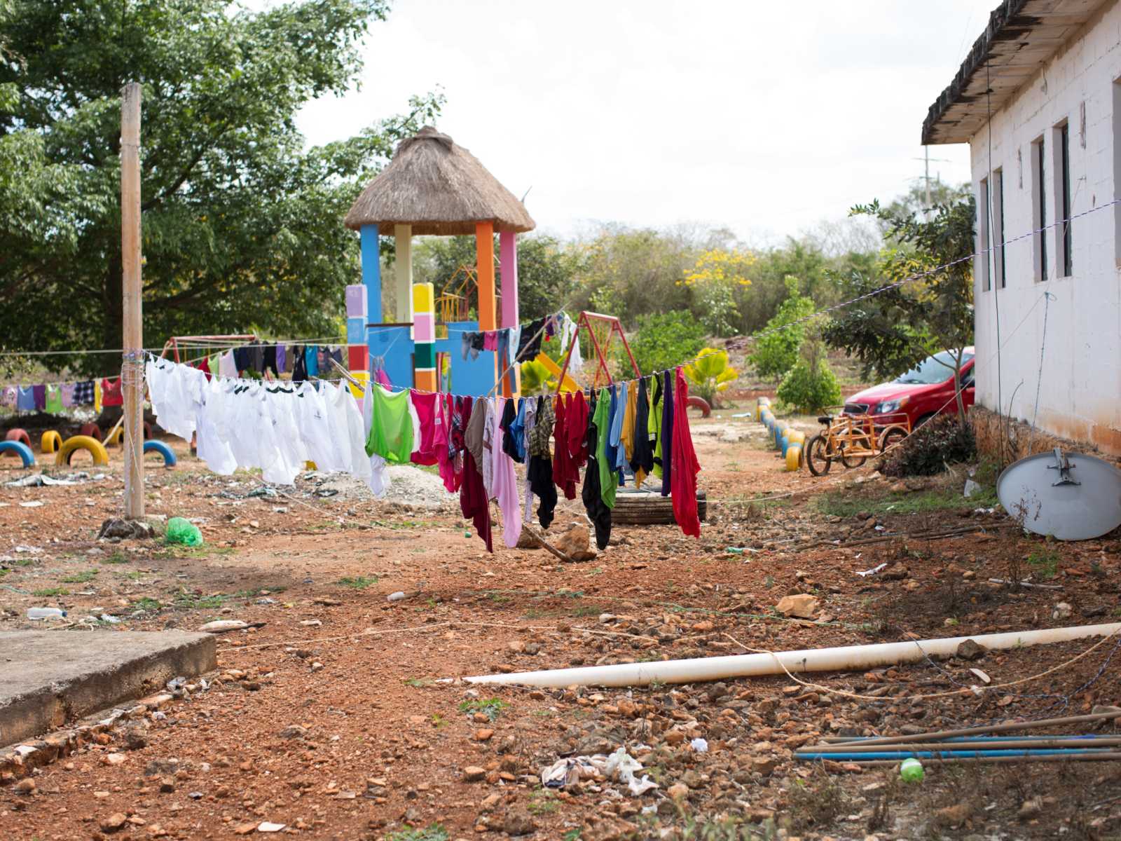 Clothes line with colorful clothes hanging outside of orphanage in Mexico. 