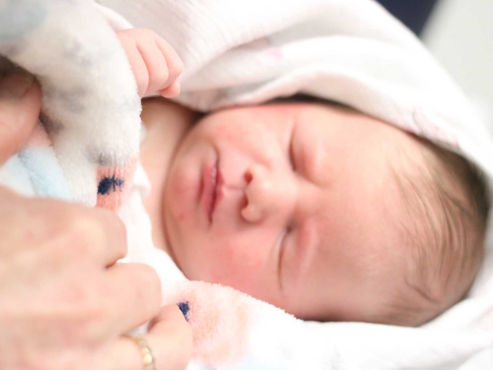 Close up of baby girl's face who soon after passed away