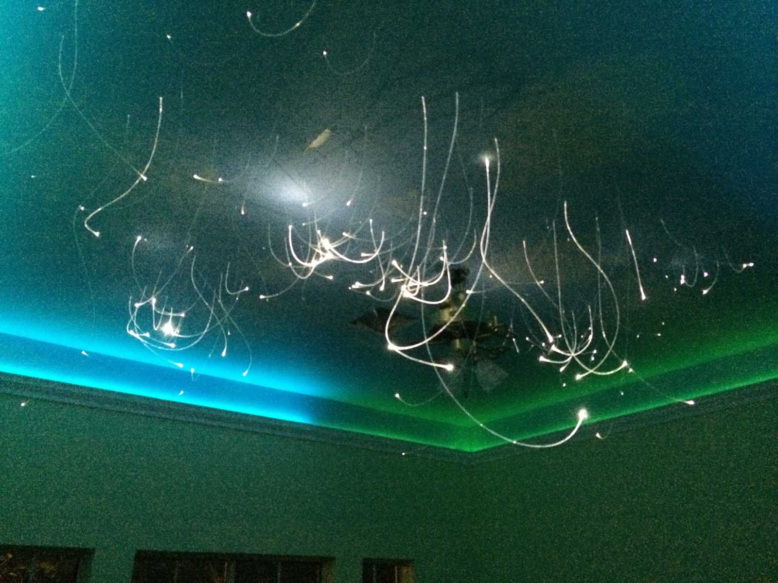 Ceiling fireworks before they are fully set up in little girl's room