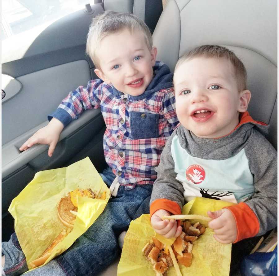 Two sons of woman who thinks she is a bad mom sit in car with McDonald's in lap