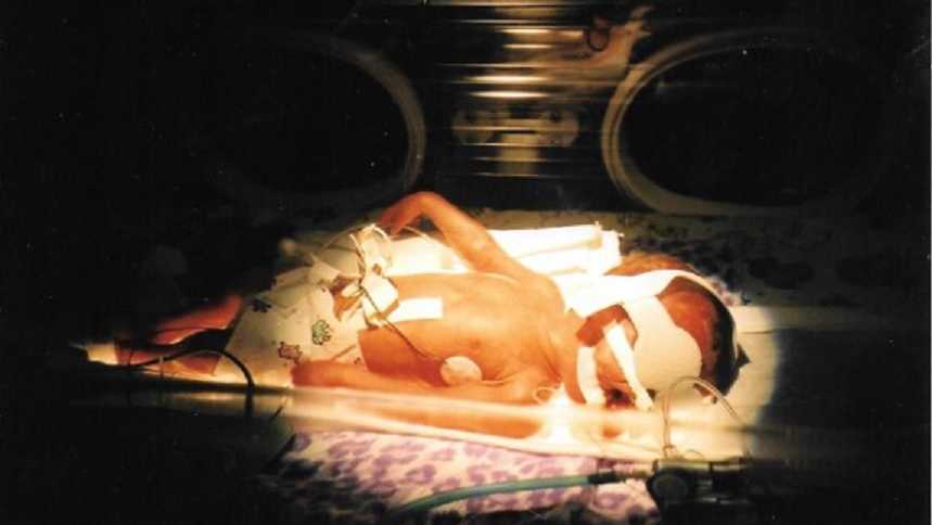 Close up of baby that was born from surrogacy who passed away