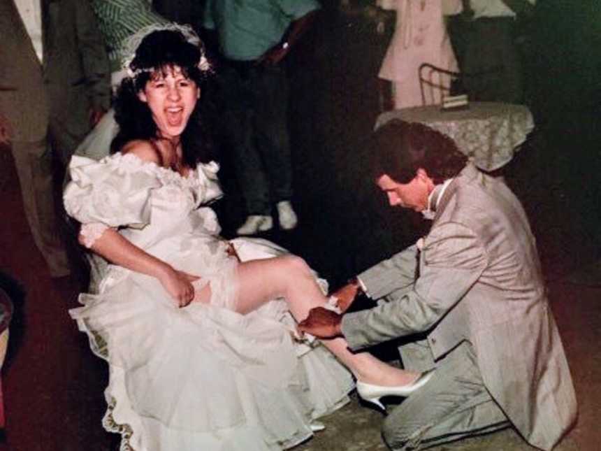 Mother who had since passed from cancer at her wedding reception while husband takes garter off