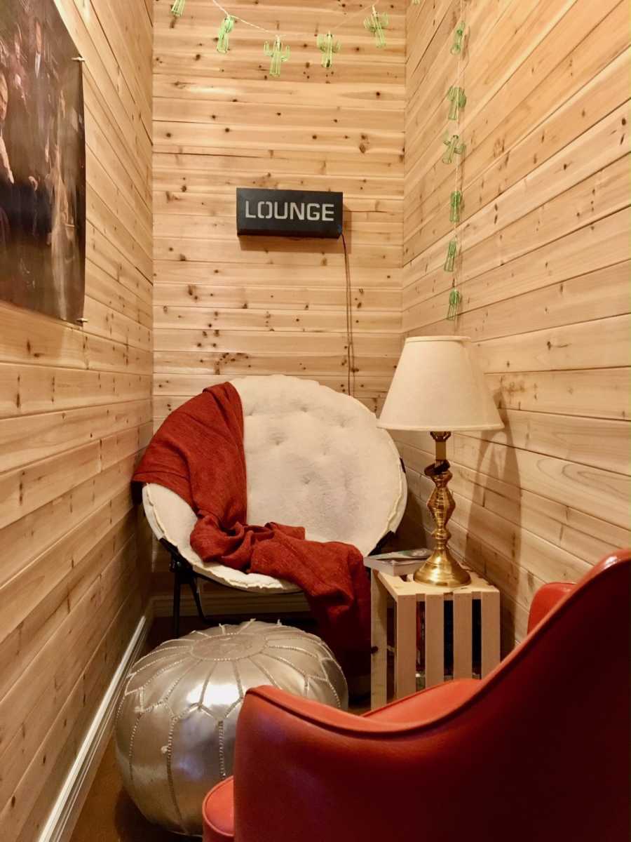 Secret room inside closet mother made for daughter with chairs, ottoman, table and lamp