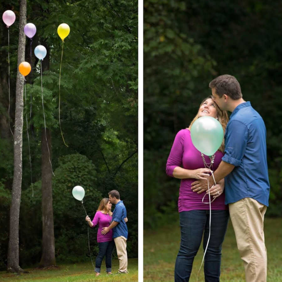 Husband holds stomach of pregnant wife while she holds balloons for miscarried babies