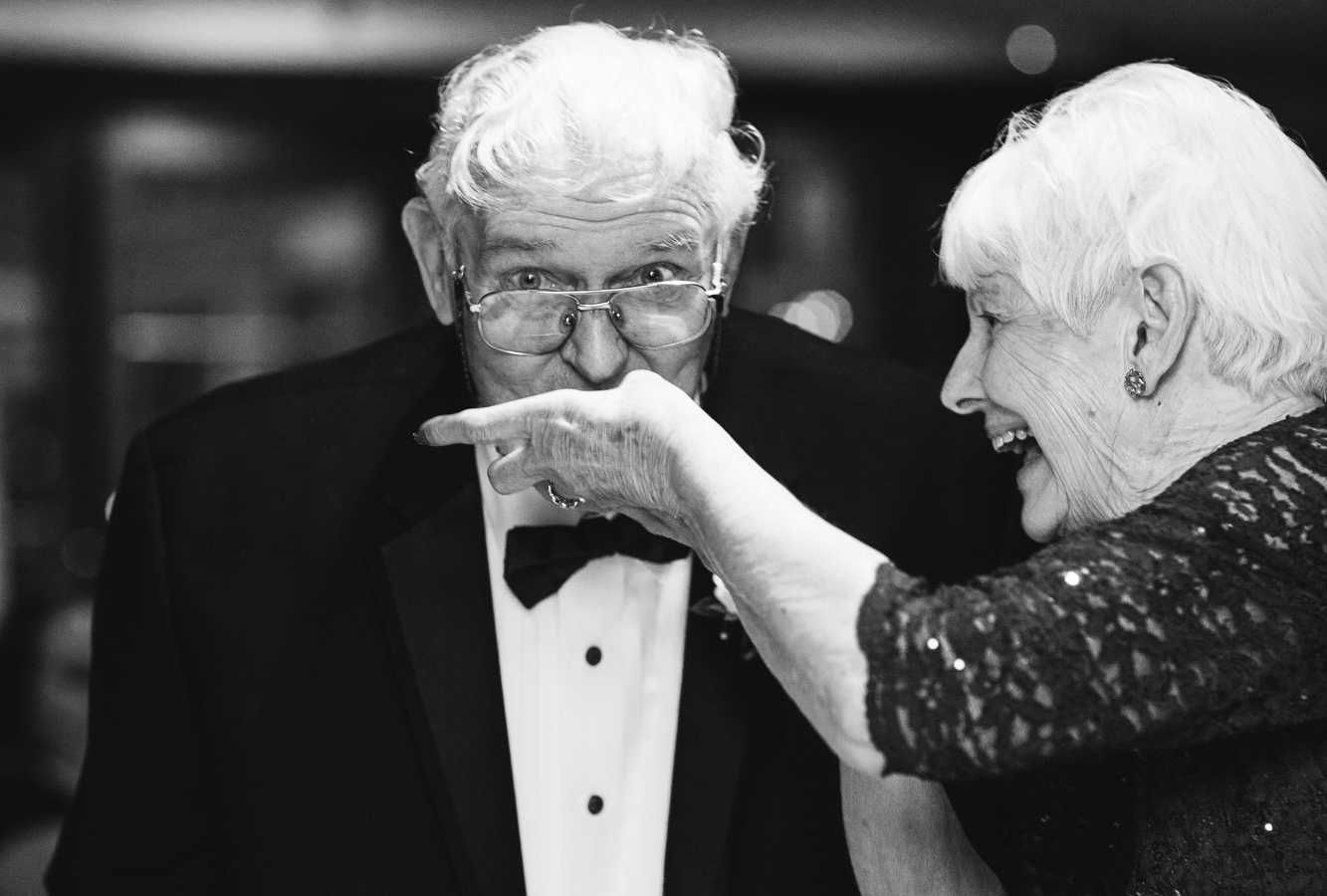 77 year old bride feeds 83 year old groom at wedding