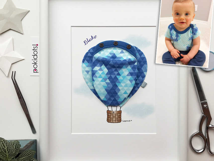 Picture from of hot air balloon and balloon is made of baby shirt