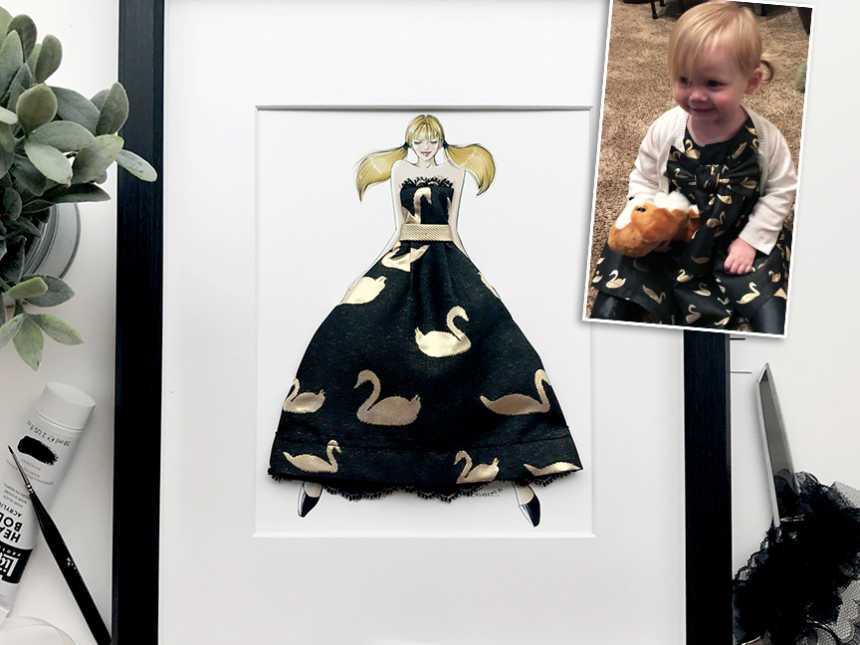 Paper doll wearing dress made from baby's dress