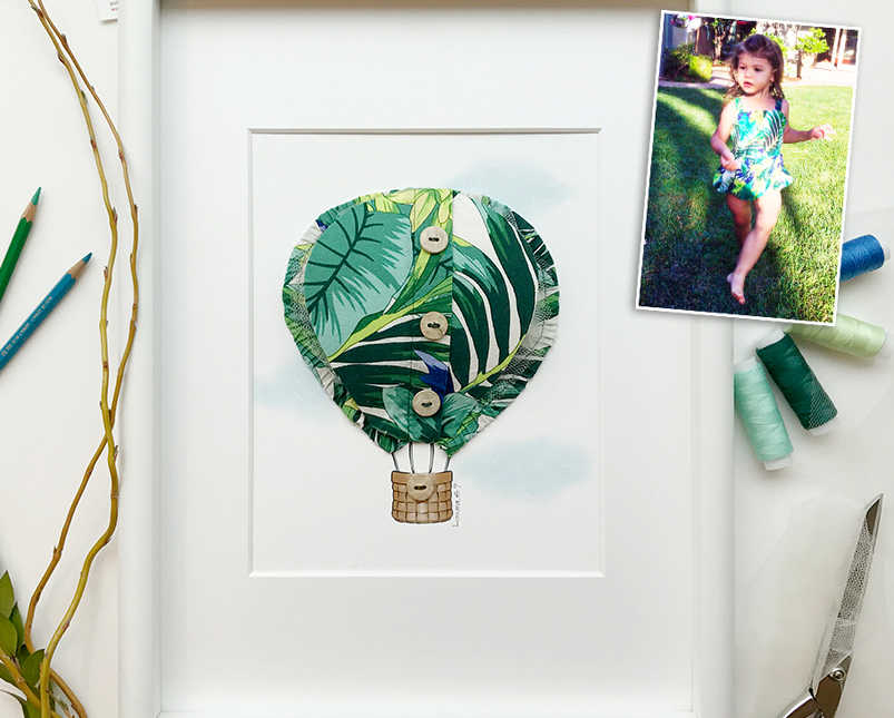 Picture frame of hot air balloon and balloon is made out of toddler swimsuit