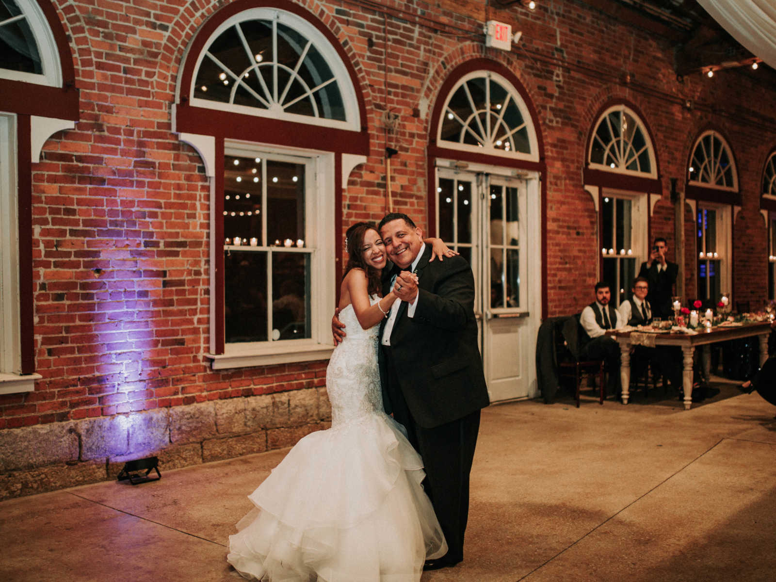 Father and daughter share dance at wedding reception