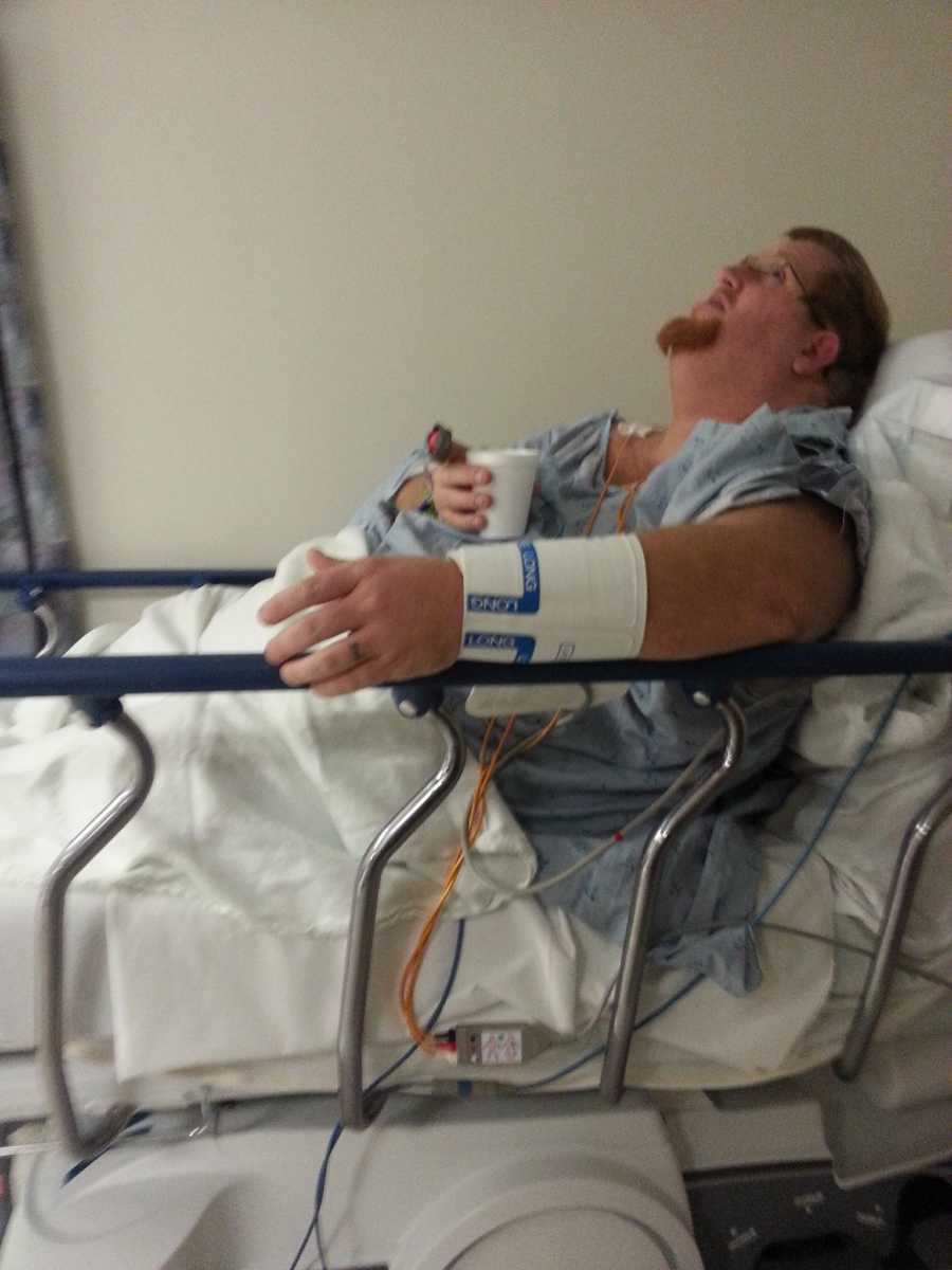 500 pound man lies in hospital bed looking up at ceiling 
