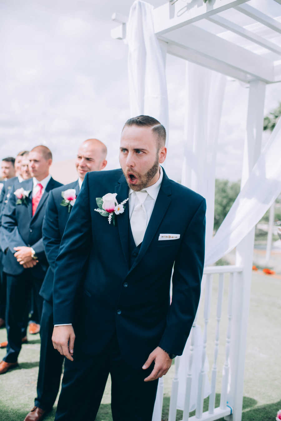 Groom's jaw drops at altar as he sees bride