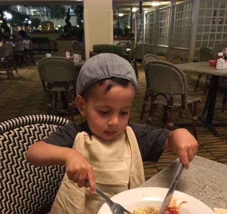 Adopted boy born without esophagus eating food at restaurant 