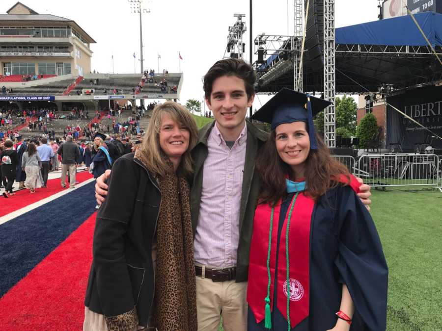 Woman who gave birth as a teen at master's degree graduation with biological son and his adopted mother