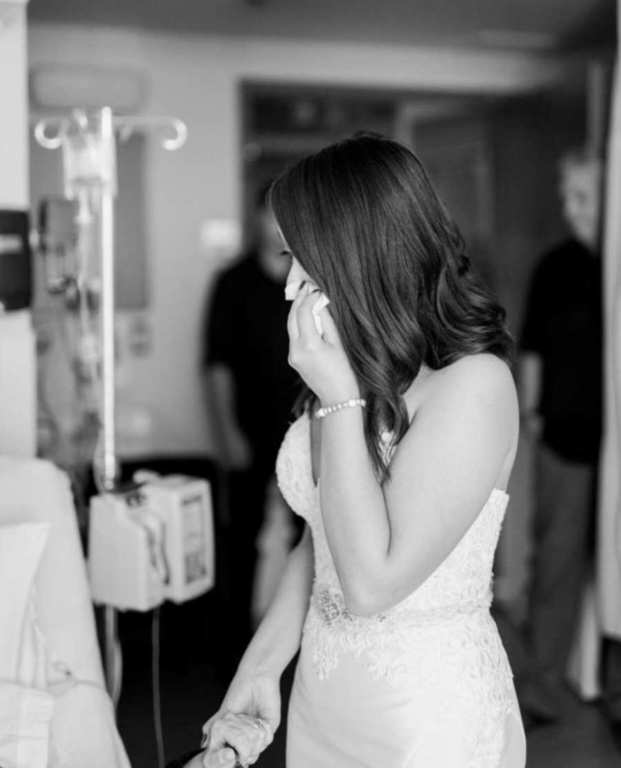 Daughter in wedding dress wipes her tears as terminally ill mother will never see her get married