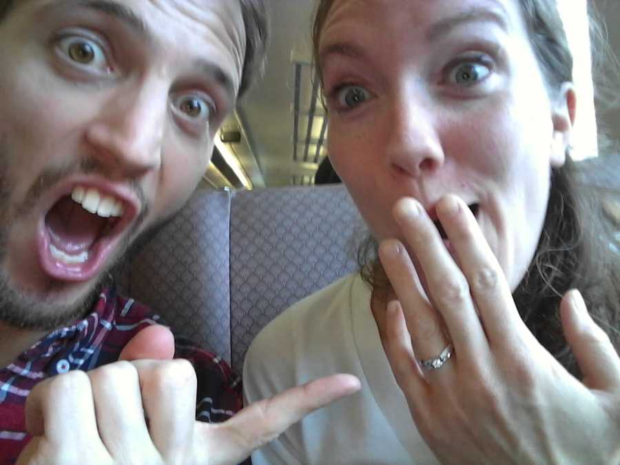 Newly engaged couple takes selfie with engagement ring