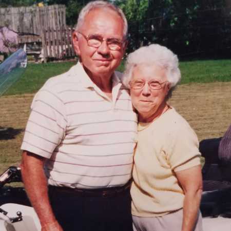 Elderly man who had stroke smiling with wife