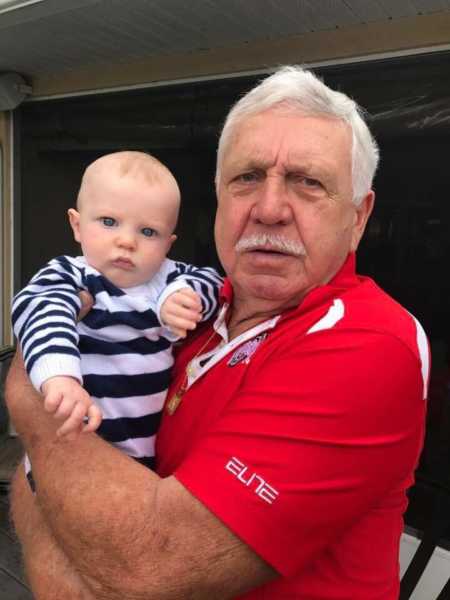 Grandfather who helped raise his granddaughter holds his great grandson