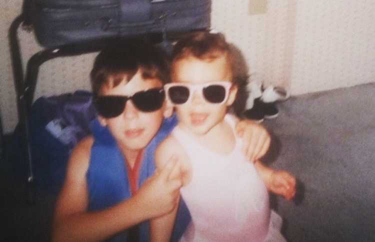 Woman who lost her dog and brother within 10 days smile next to brother in sunglasses when they were little