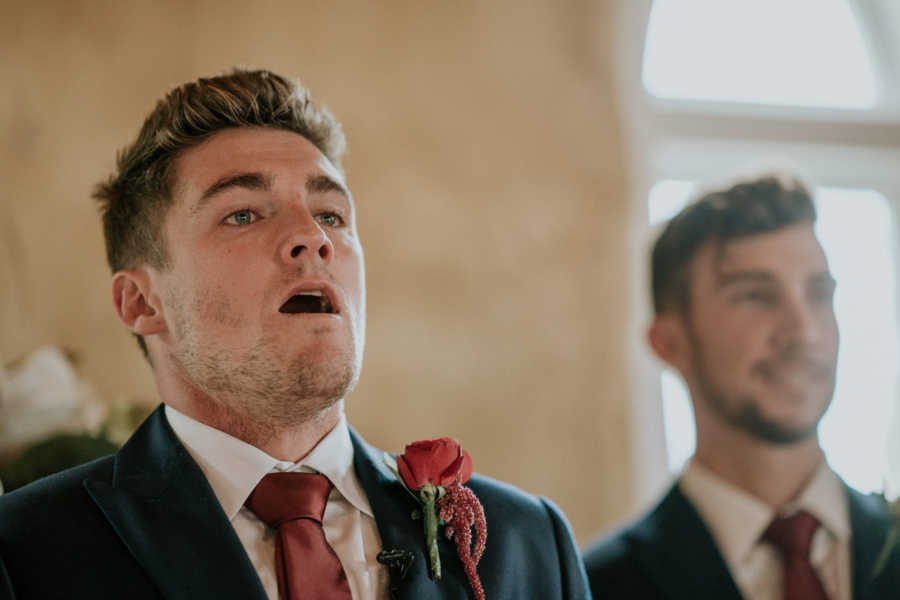 Groom whose father has cancer takes deep breath at altar of wedding