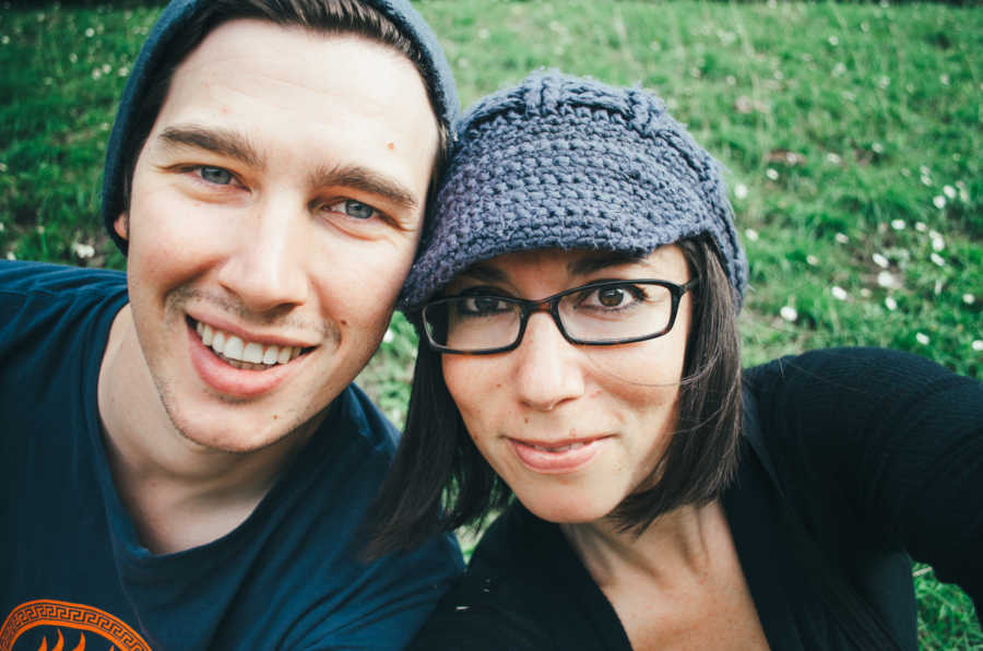 Photographer who struggled with infertility smiles in selfie with husband