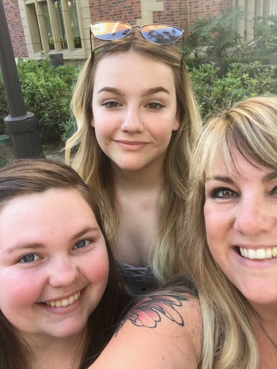 Mother who tells her children what she'd want them to know if she were gone smile in selfie with two daughters