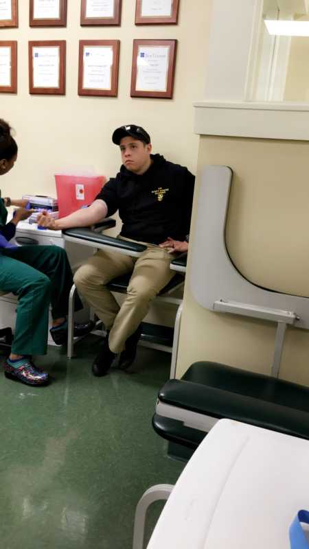 Husband getting blood work drawn for wife who has fertility issues