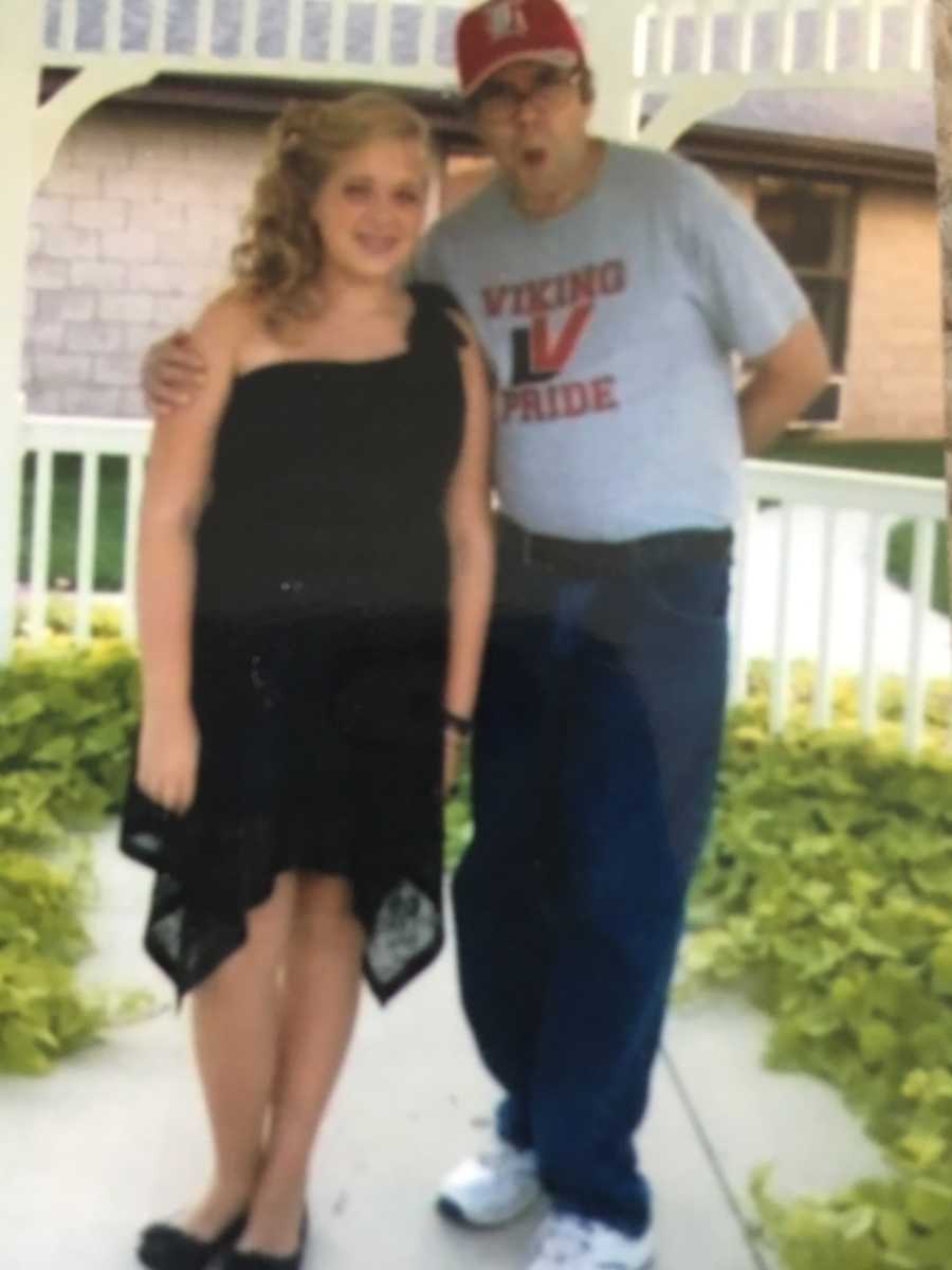 Man who will suffer from dementia later in life stands with arm around daughter before school dance