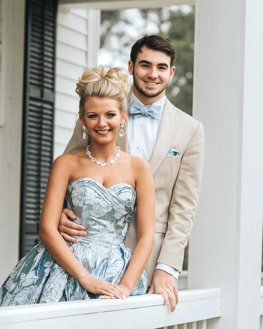 Teen with focal seizures smiling with prom date