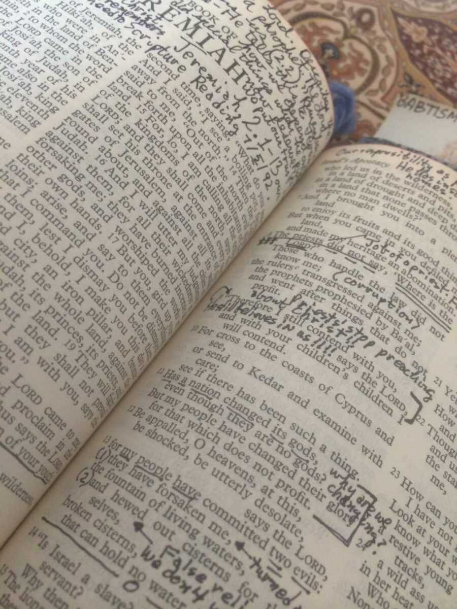 Bible pages with ink notes in margins