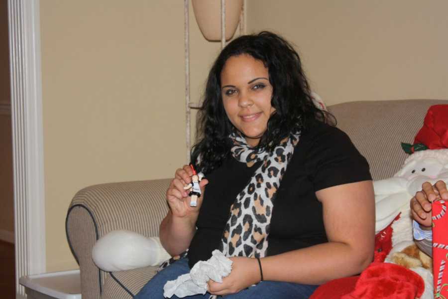 Woman who lost 155 pounds sitting on couch as a teen on Christmas