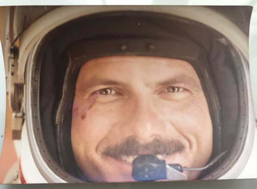 Dad with mustache in space helmet 