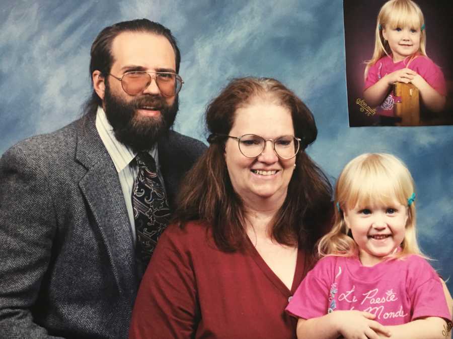 Mother and father who will later suffer from dementia and parkinson's sit smiling with daughter