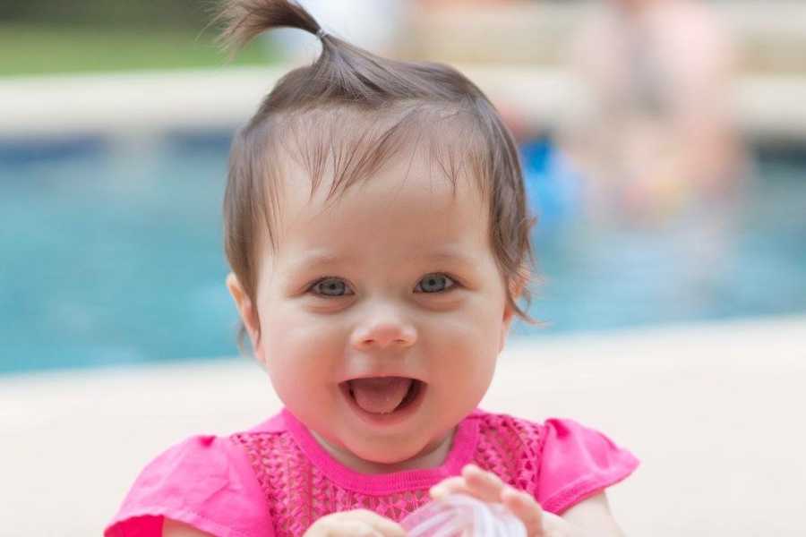 Toddler smiles in front of pool before doctors find tumor