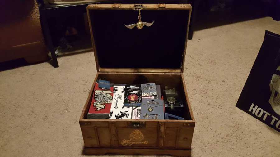 Trunk opened full of Harry Potter memorabilia 