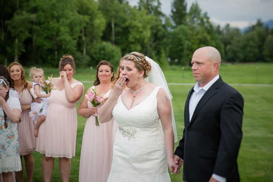 Bride holds hand over her mouth at wedding as she sees man who is alive due to her late son's heart