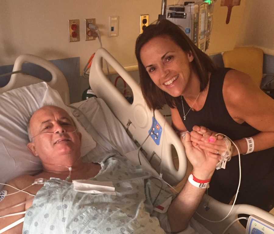 Man whose wife's friend was his kidney donor lays in hospital after transplant holding hands with donor