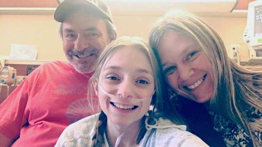 23 year old on oxygen smiles in selfie with parents after ling transplant