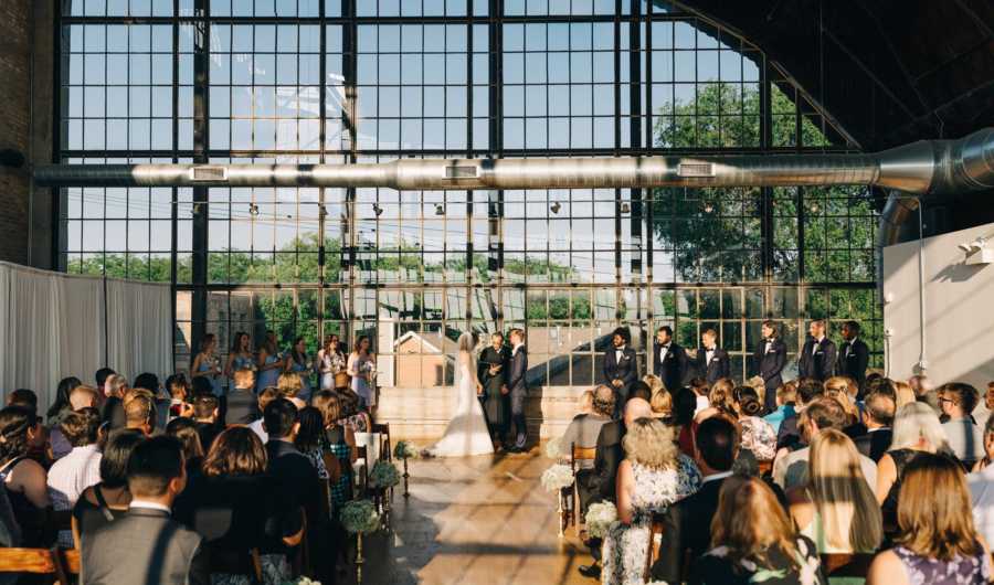 Couple exchange their vows in greenhouse wedding ceremony