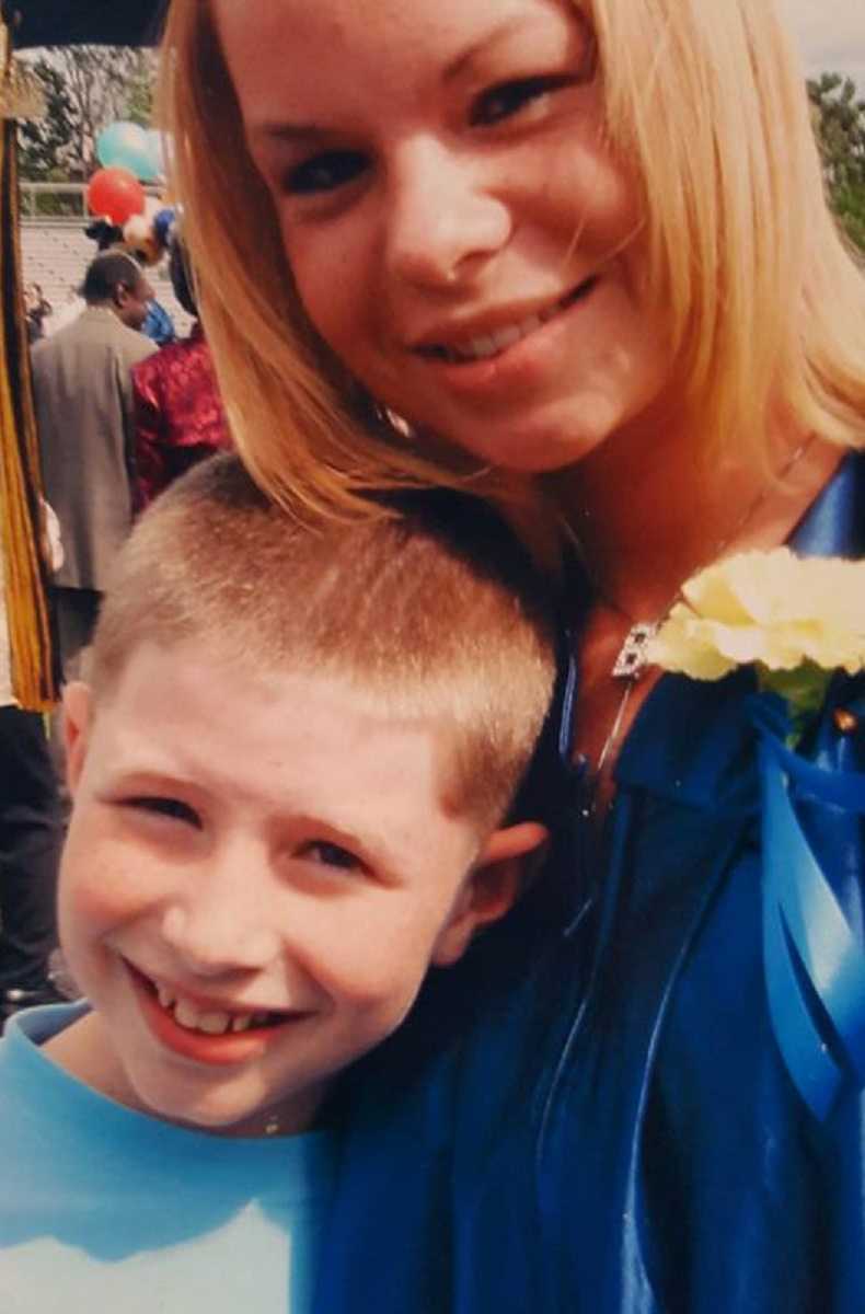 Siblings take an up-close photo together at sister's graduation