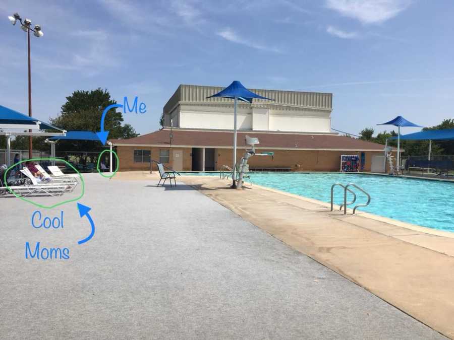 Woman takes a photo of the community pool, showing where she hangs out