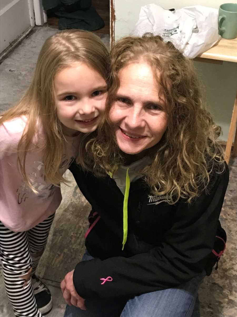 Woman smiles for a photo with her niece