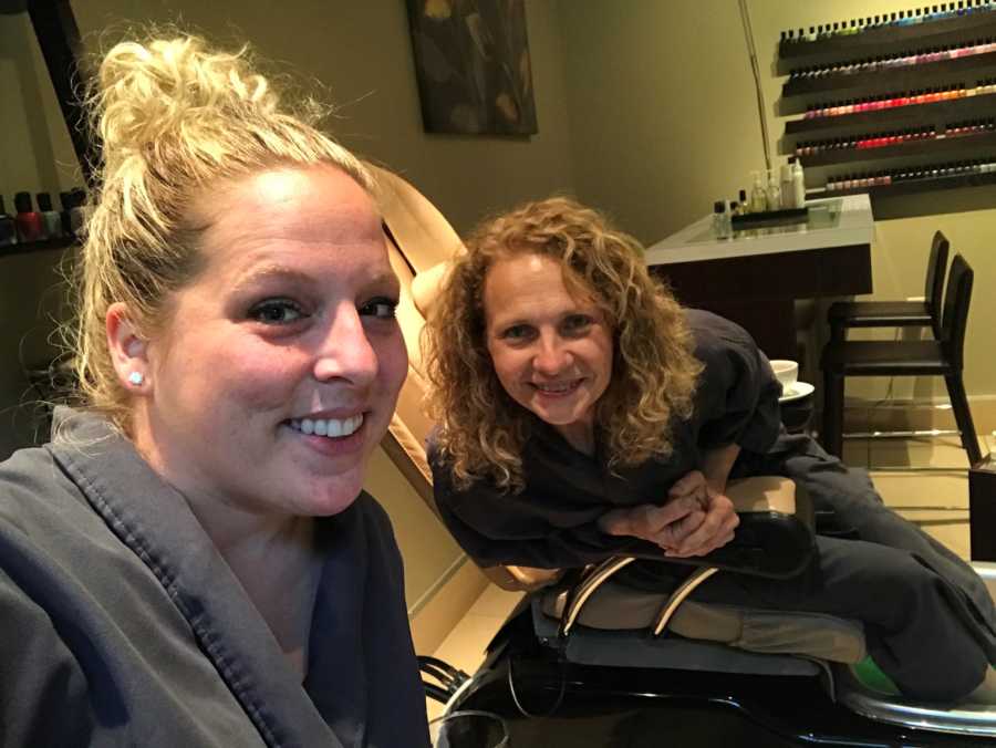 Two sisters take a selfie while getting a pedicure together